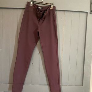 Dark red skinny slacks